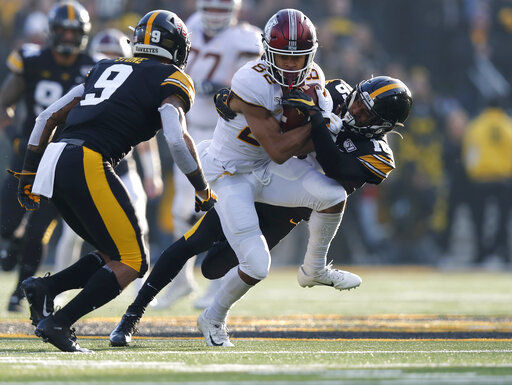 No. 23 Iowa hands No. 7 Minnesota its first loss, 23-19